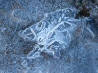 Muster in rauer Eisschicht